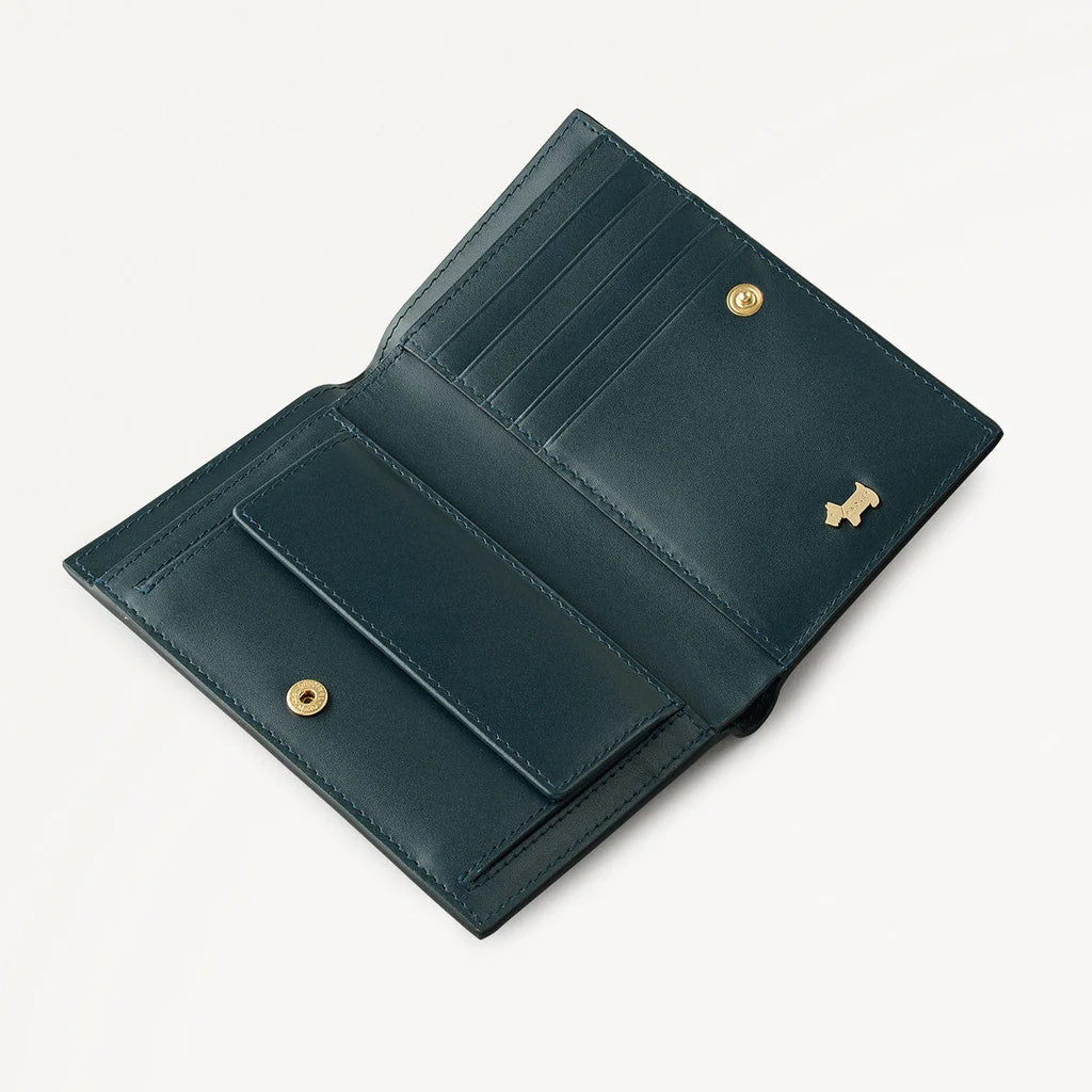 Teal leather wallet with gold accents on a white background