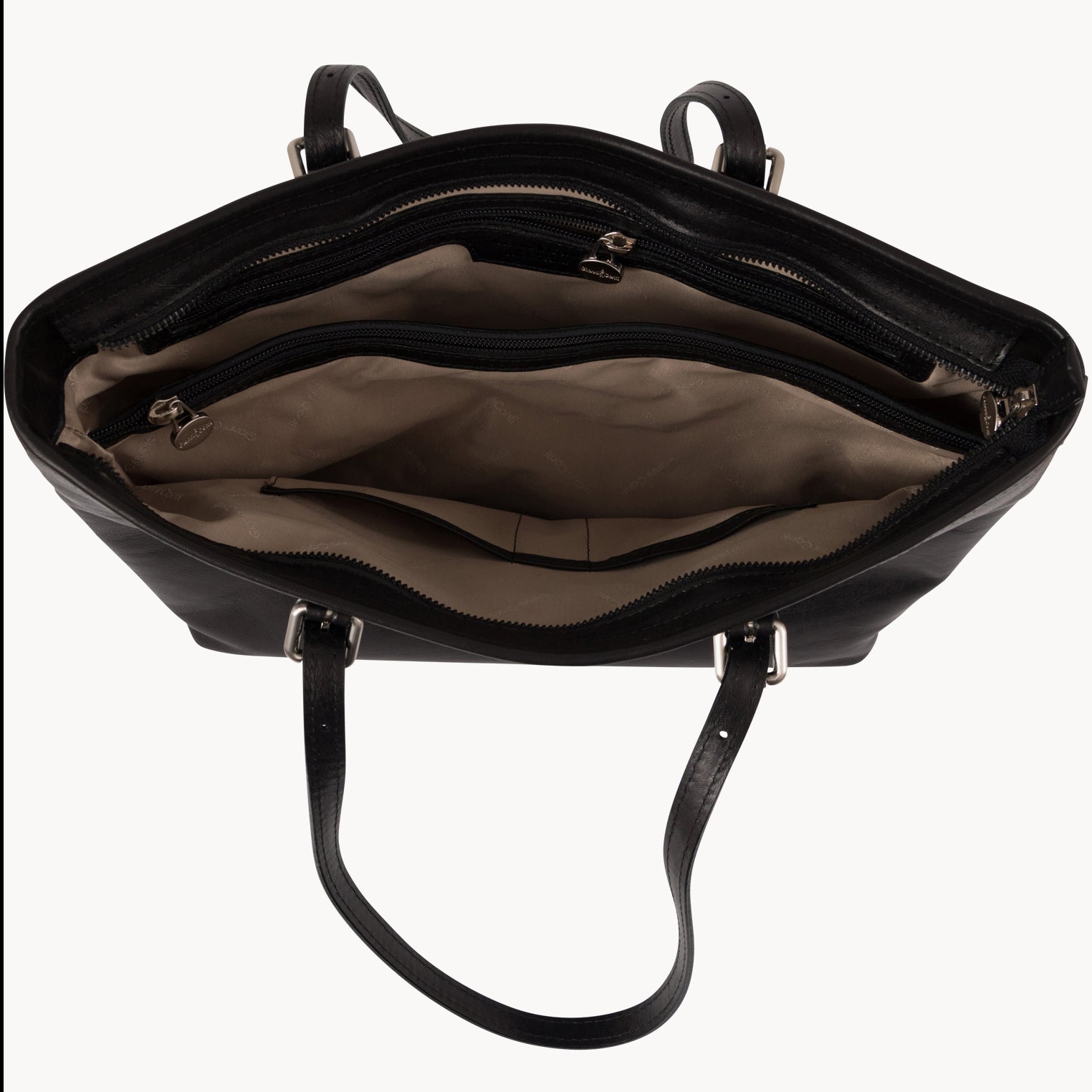 Black leather handbag with open front compartment on a white background