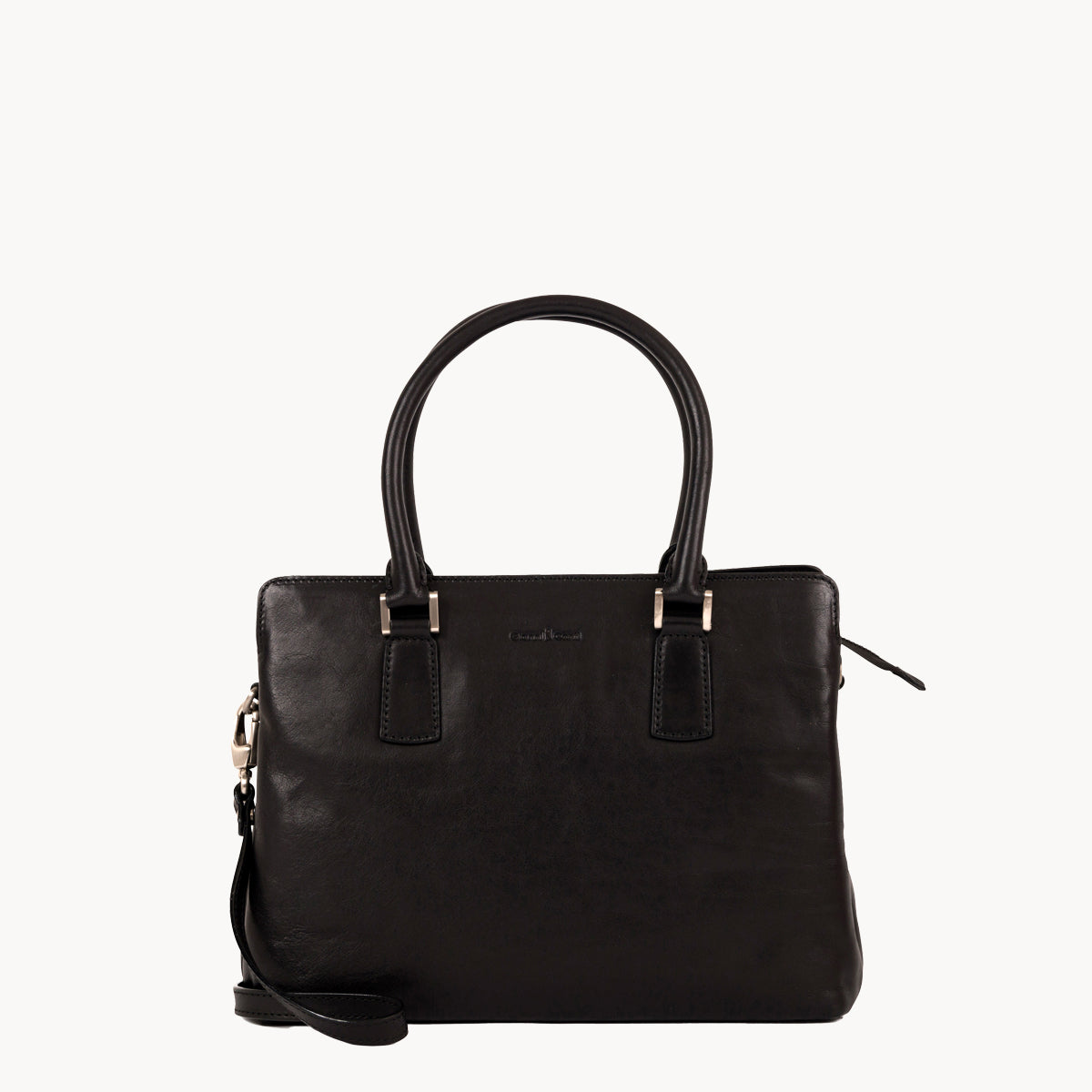 Black handbag with a strap on a white background