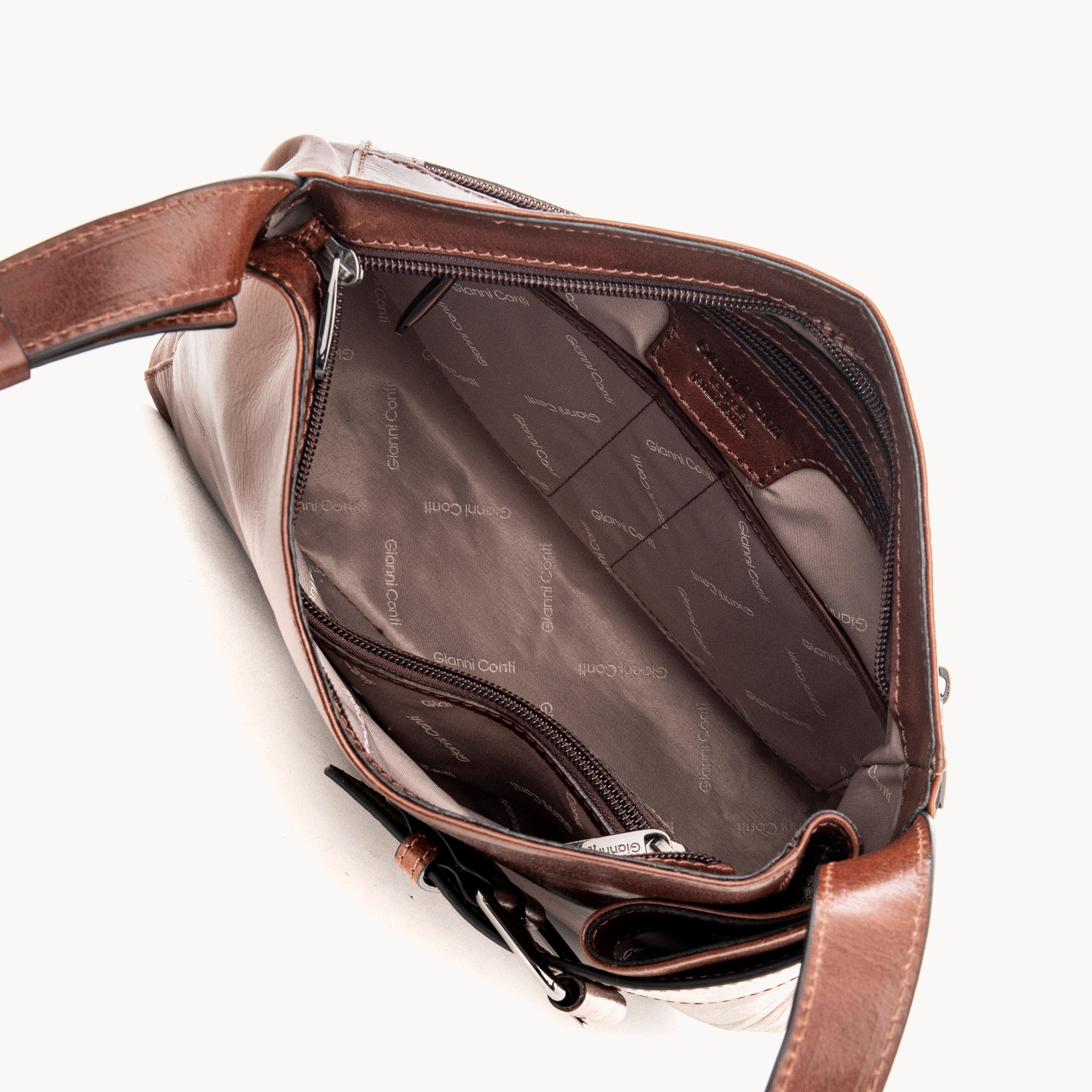 Brown leather bag with visible brand name on a white background