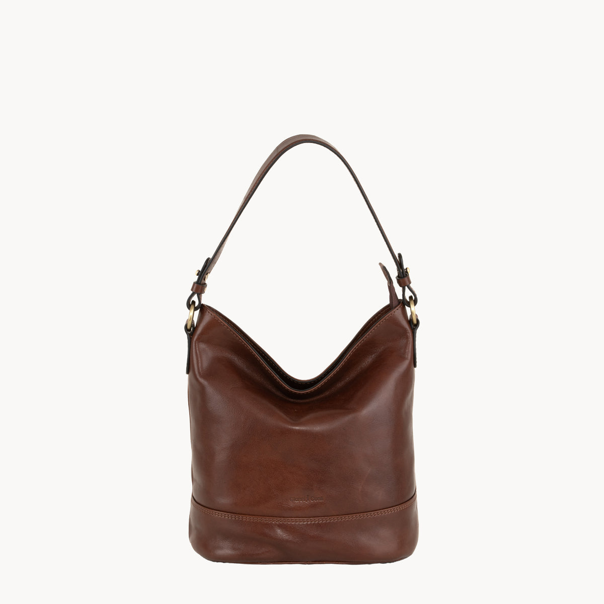 Brown leather handbag on a white background