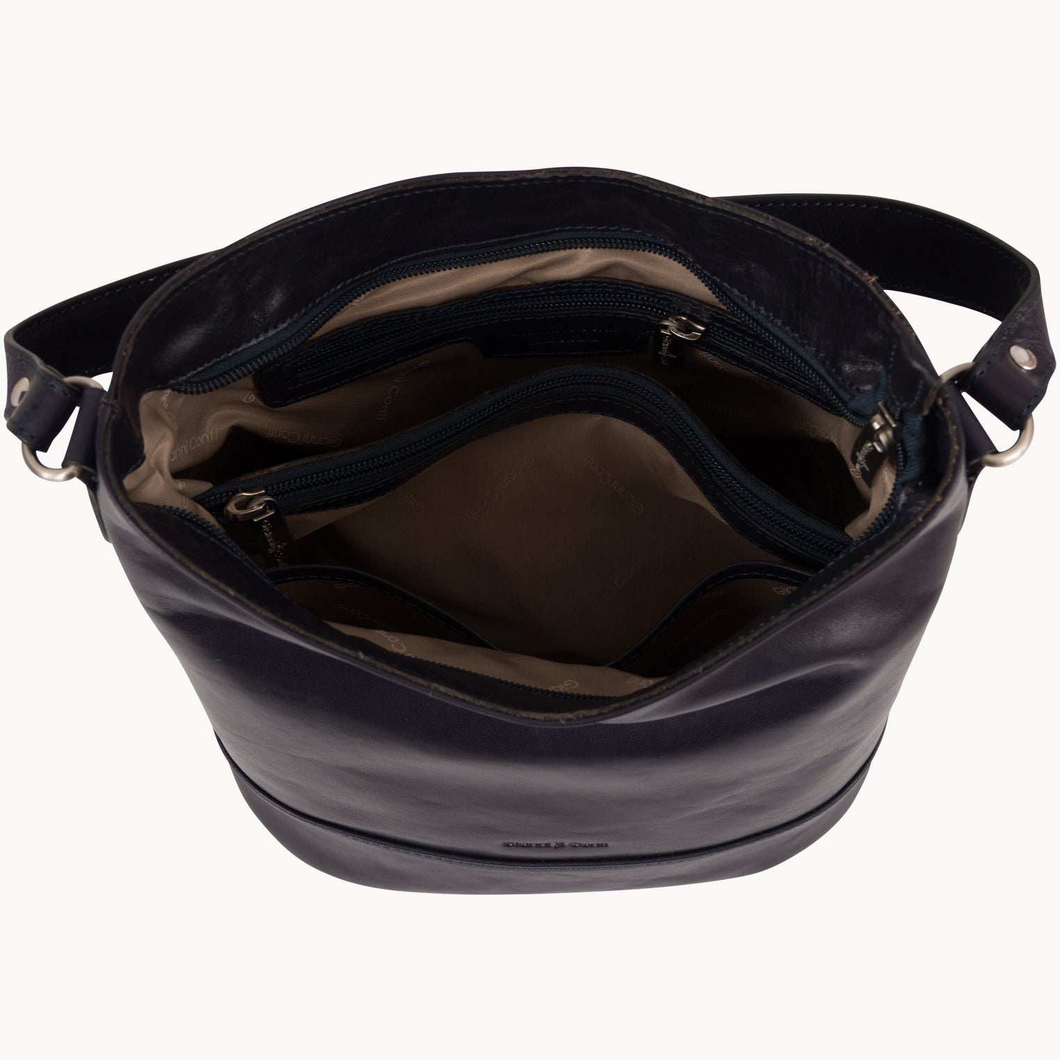 Blue leather handbag with a visible brand name on a white background