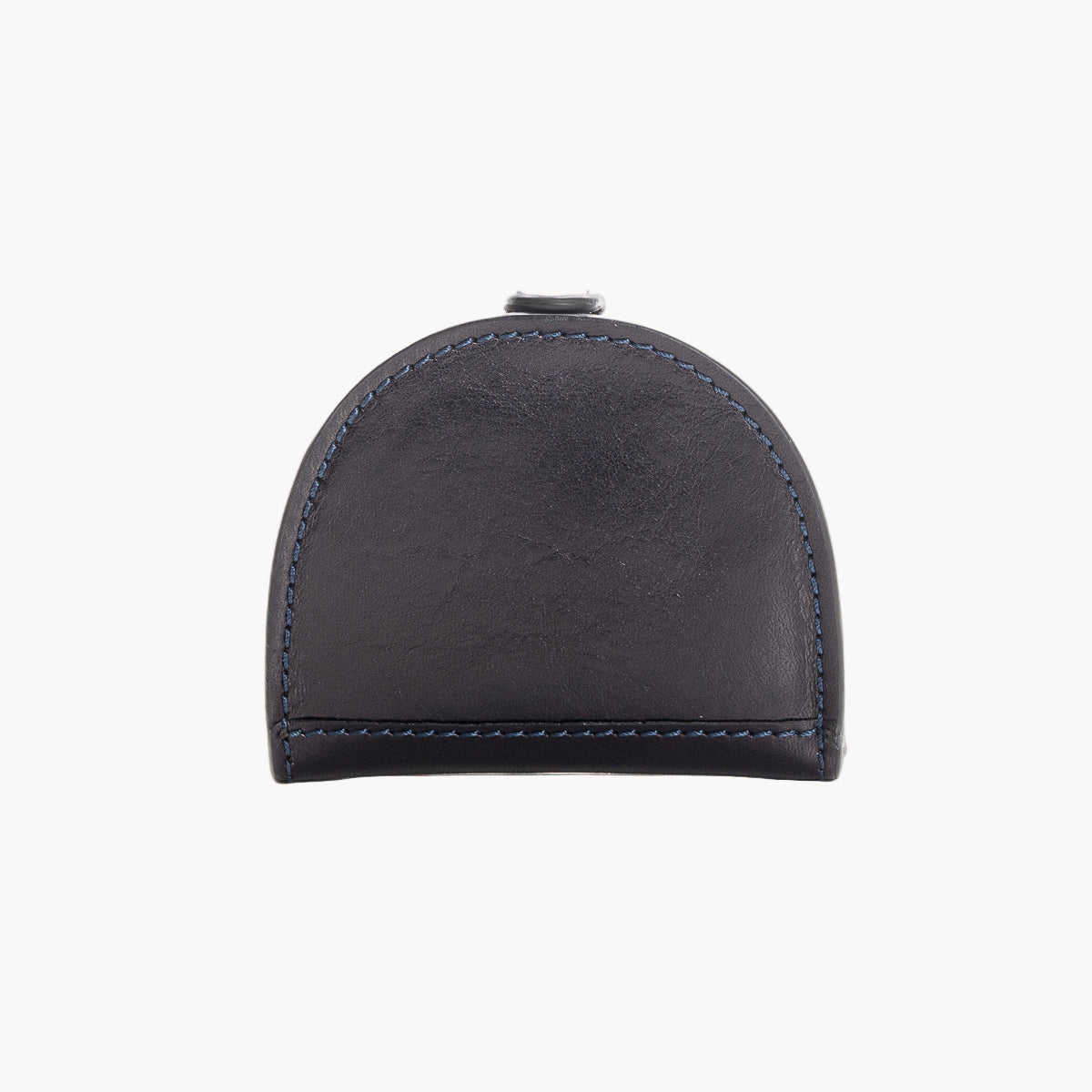 Blue leather coin purse with visible stitching on a white background