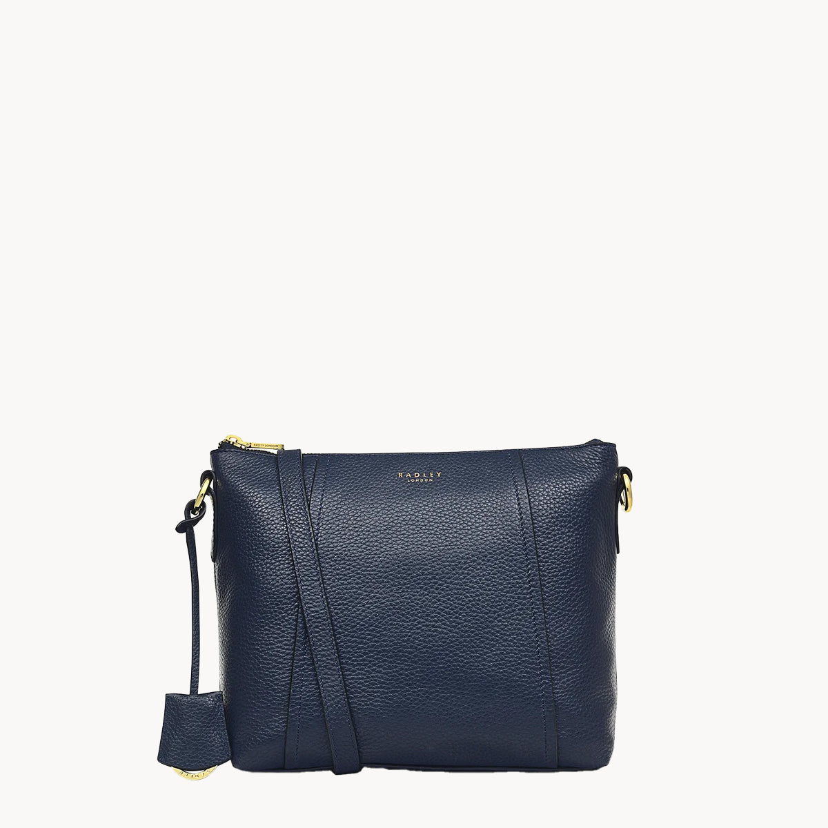 Navy blue leather crossbody bag on a white background