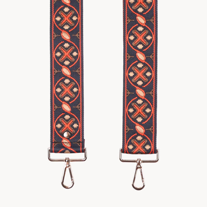 Two fabric straps with a pattern on a white background