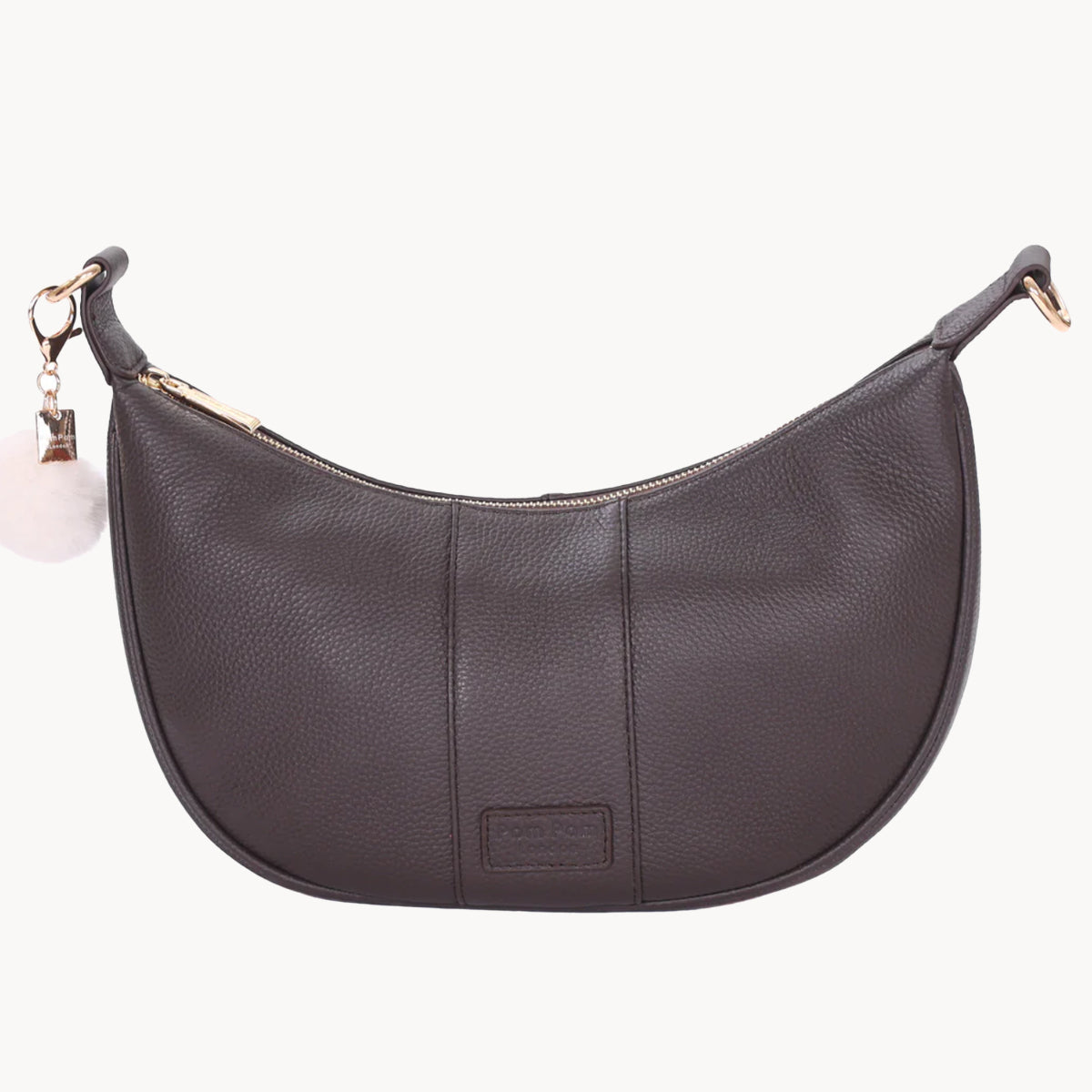 Brown handbag with a visible brand logo on a white background