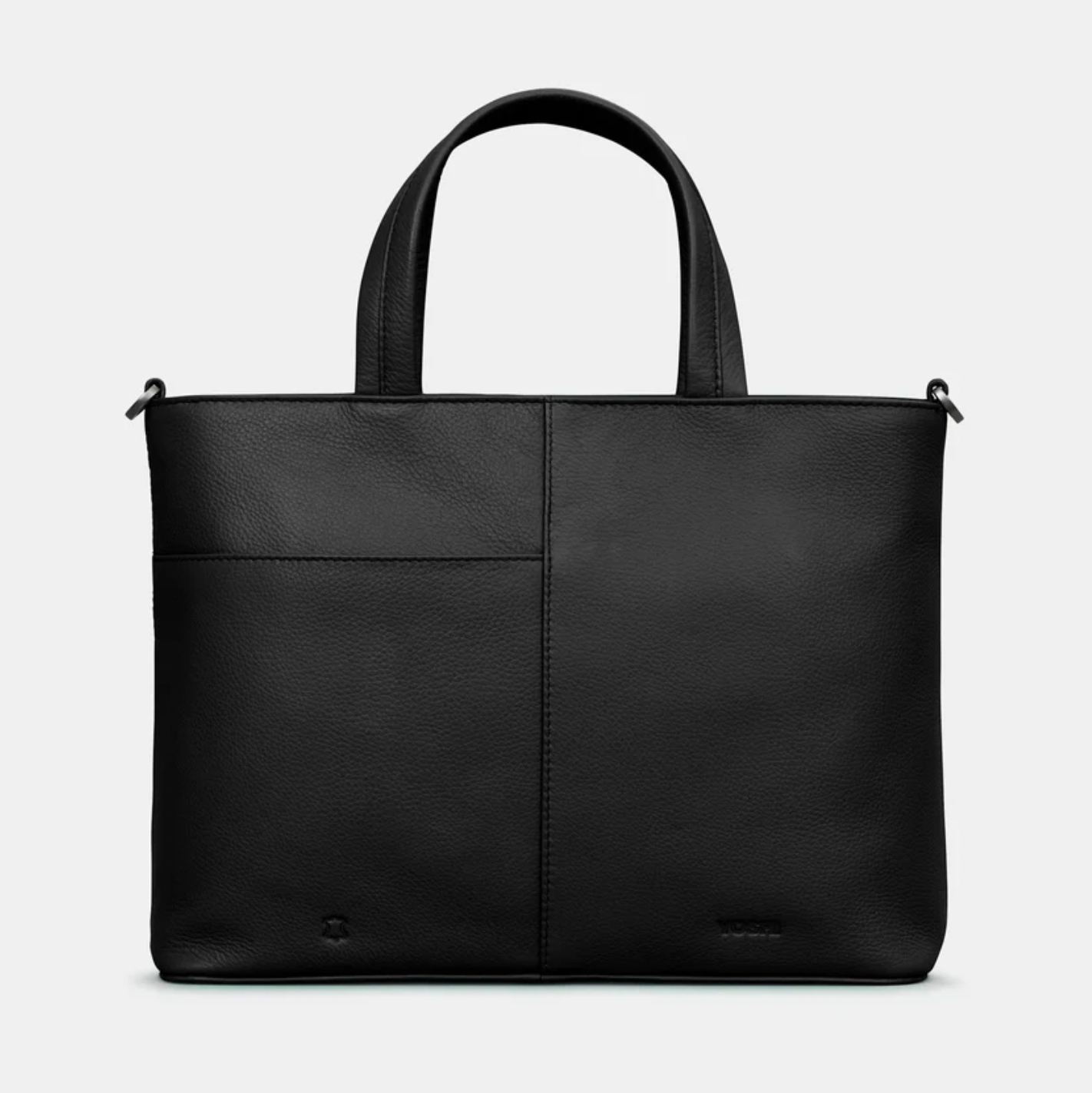 Black leather tote bag on a light gray background