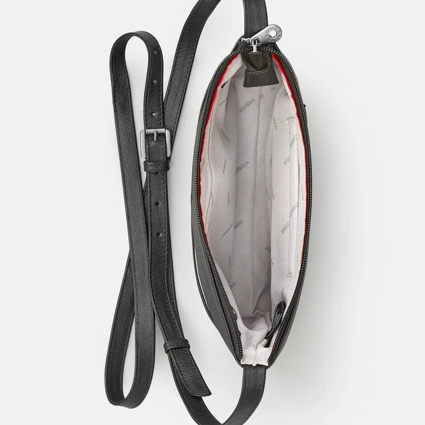 Black crossbody bag with a strap on a white background