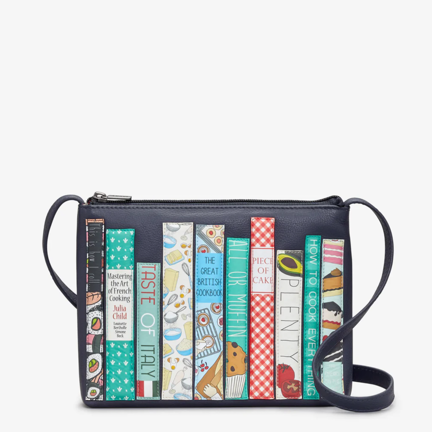 Crossbody bag with book-themed design on a white background