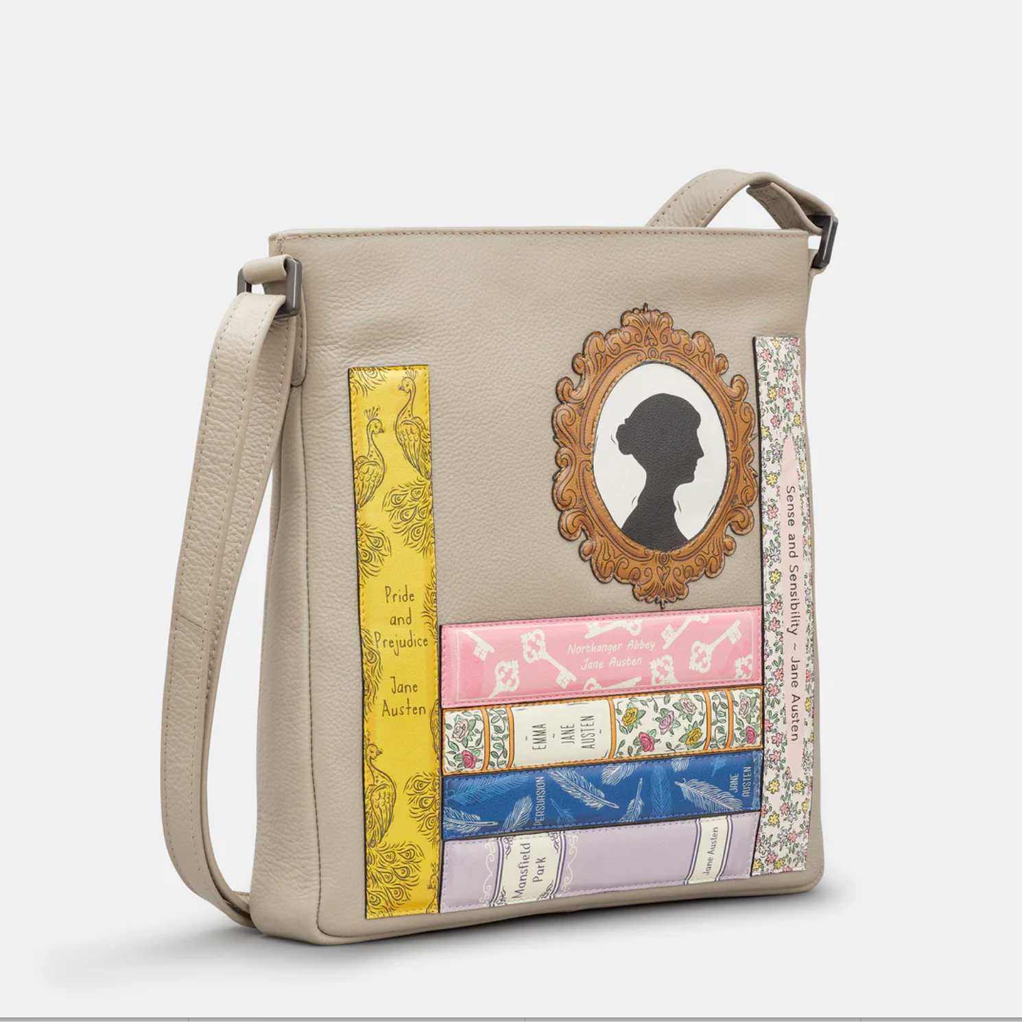 Leather crossbody bag in warm grey with appliqué Jane Austin books and portrait design on front.