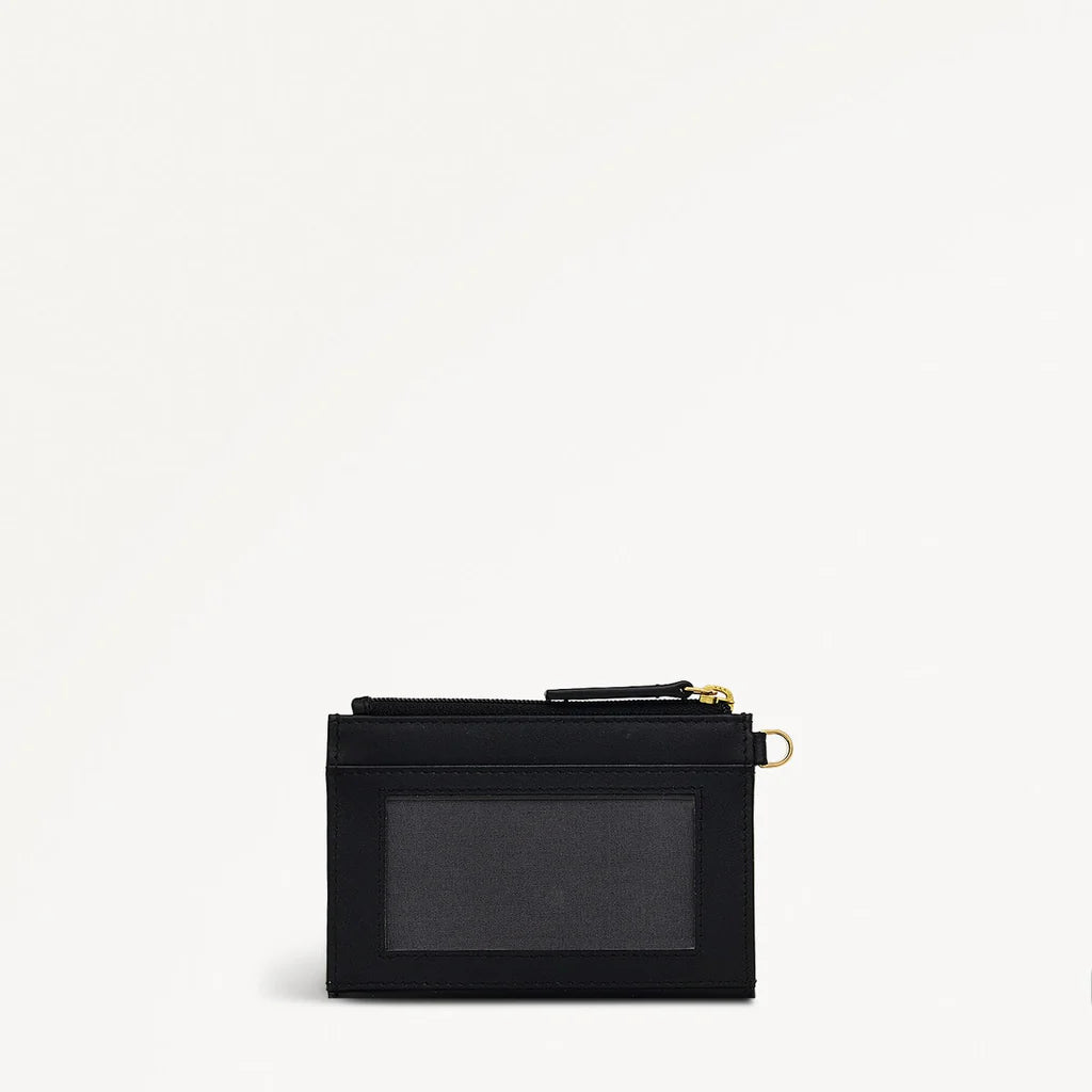 Black coin purse with gold accents and Radley logo on a white background with ID section