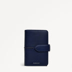 Navy leather planner with a strap on a white background