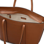 Brown leather handbag with visible brand logo on a white background