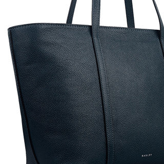 Black leather tote bag with visible brand name on a white background