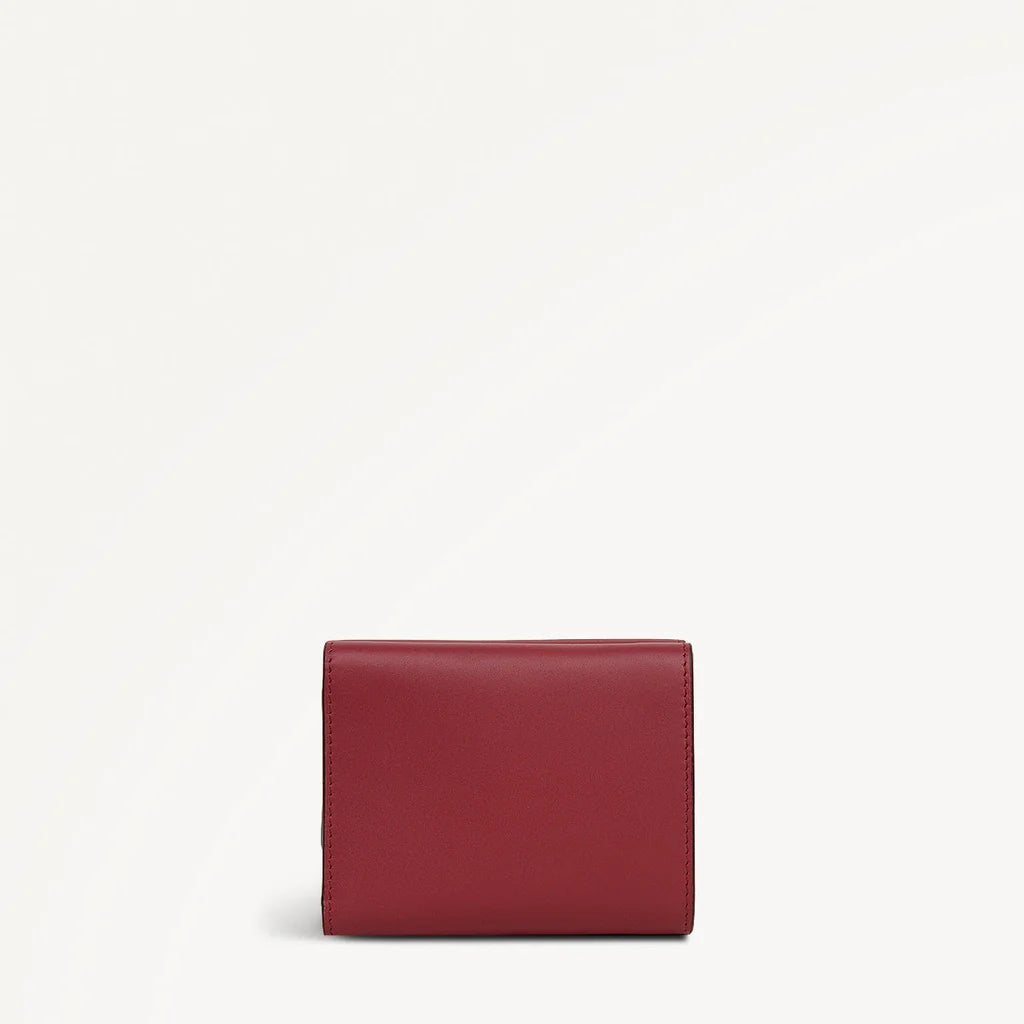Red wallet on a white background