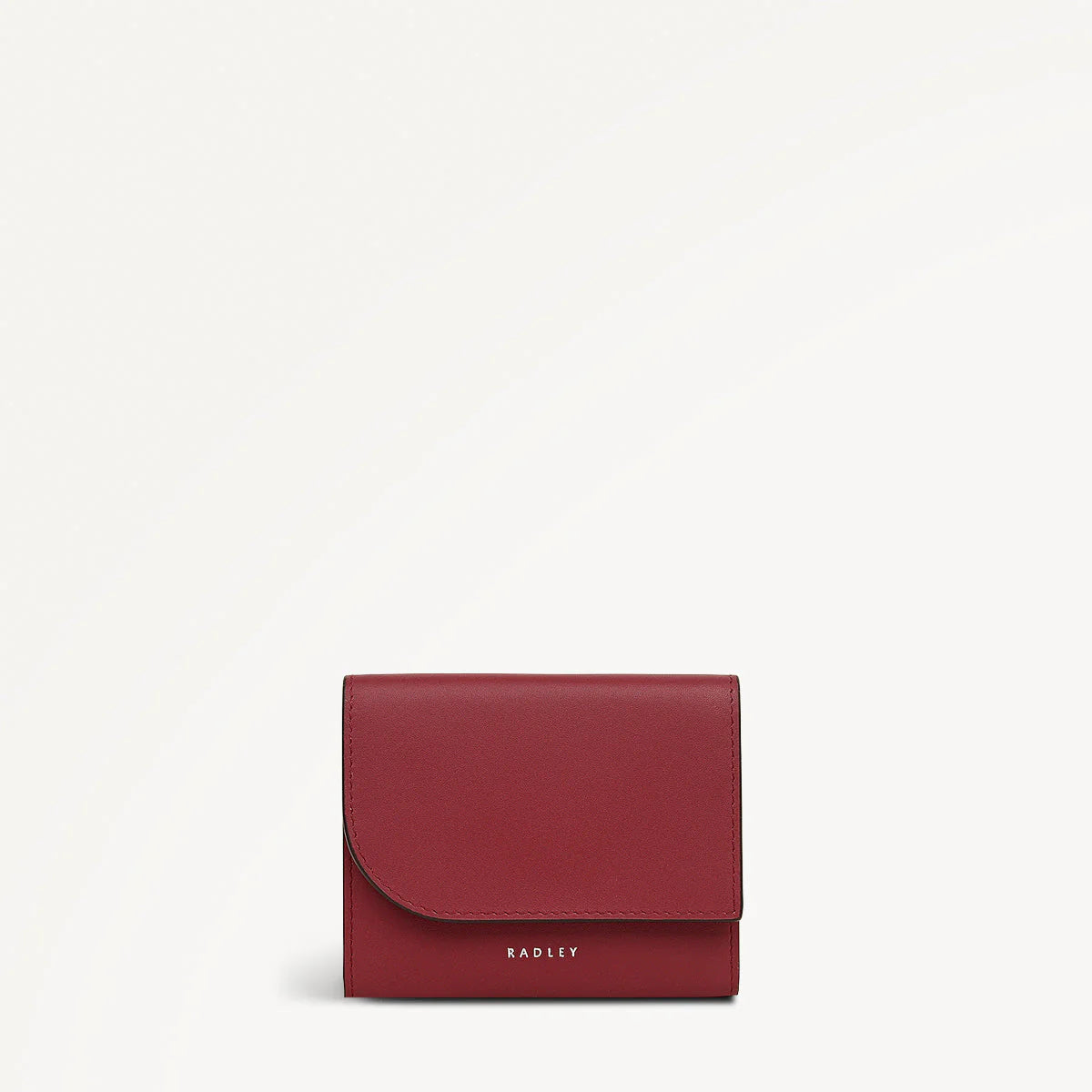Red wallet with 'Radley' branding on a white background