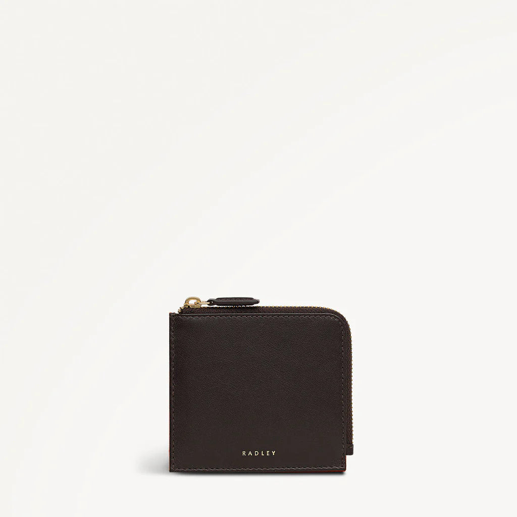 Black wallet with a gold zipper on a white background