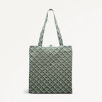 Green foldaway shopper  with Radley geometric monogram print on a light gray background