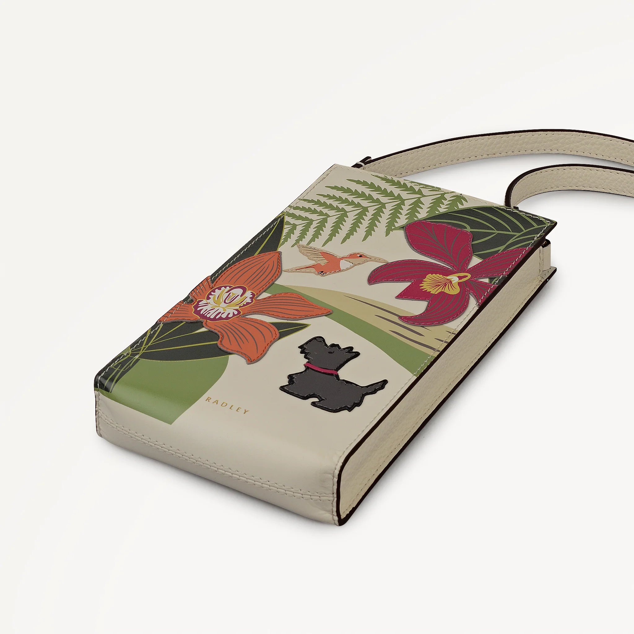 Side view of Radley crossbody phone bag with strap