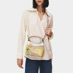 Radley Spring Blooms Leather and Raffia Floral Picture Bag - lifestyle shot showing grab handle and crossbody strap