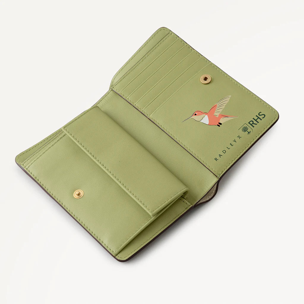 Radley RHS 26 Medium Purse with Floral and dog design wallet on a white background and green interior.