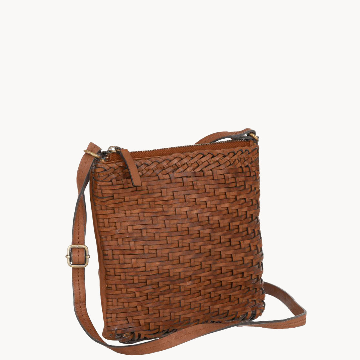 Brown woven handbag on a white background