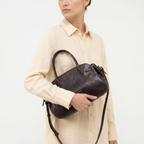Gianni Conti Leather Bowling Bag in Chocolate - carried on the arm by model