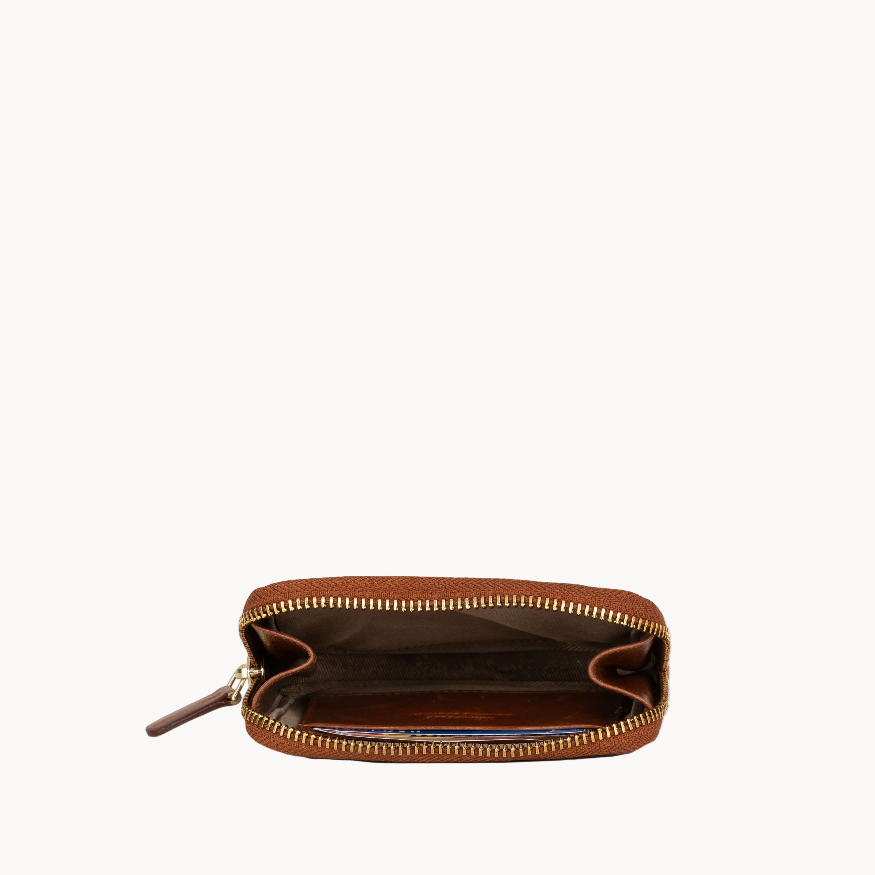 Brown zipper pouch on a white background