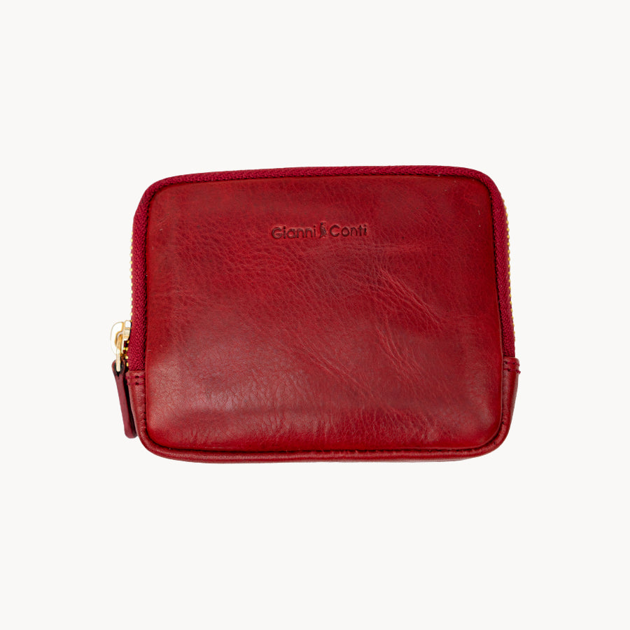 Red leather purse with gold zipper on a white background