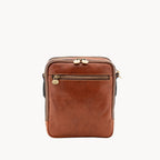 Brown leather crossbody bag on a white background