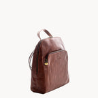 Brown leather backpack on a white background