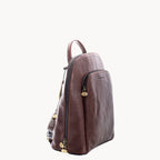 Brown leather backpack with gold zippers on a white background