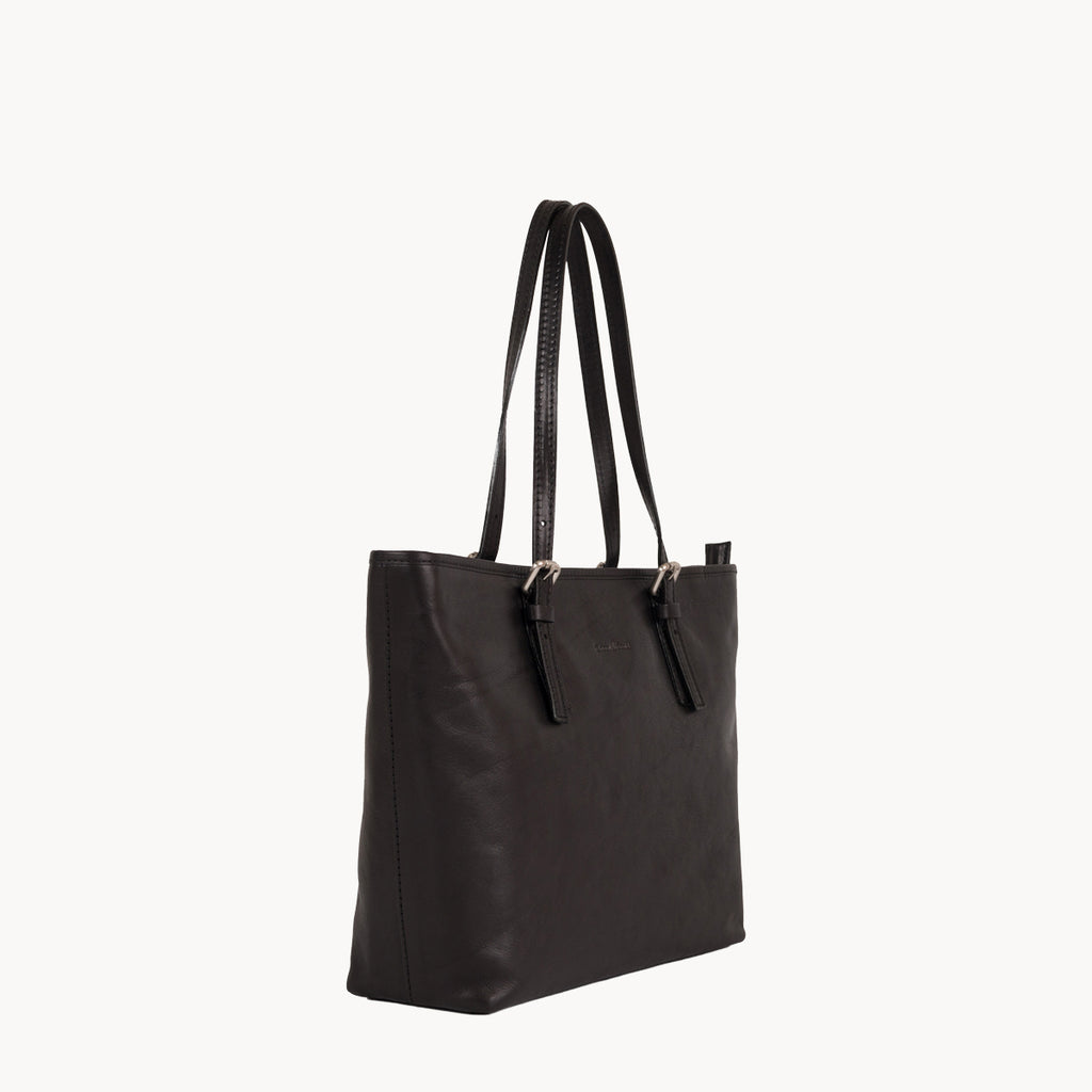 Black tote bag with shoulder straps on a white background