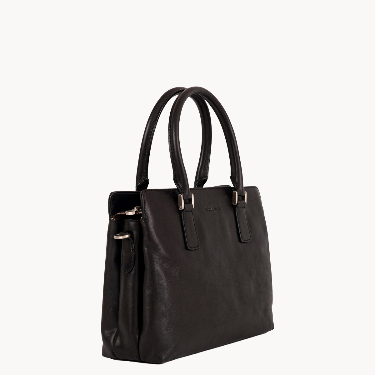 Black handbag with gold hardware on a white background