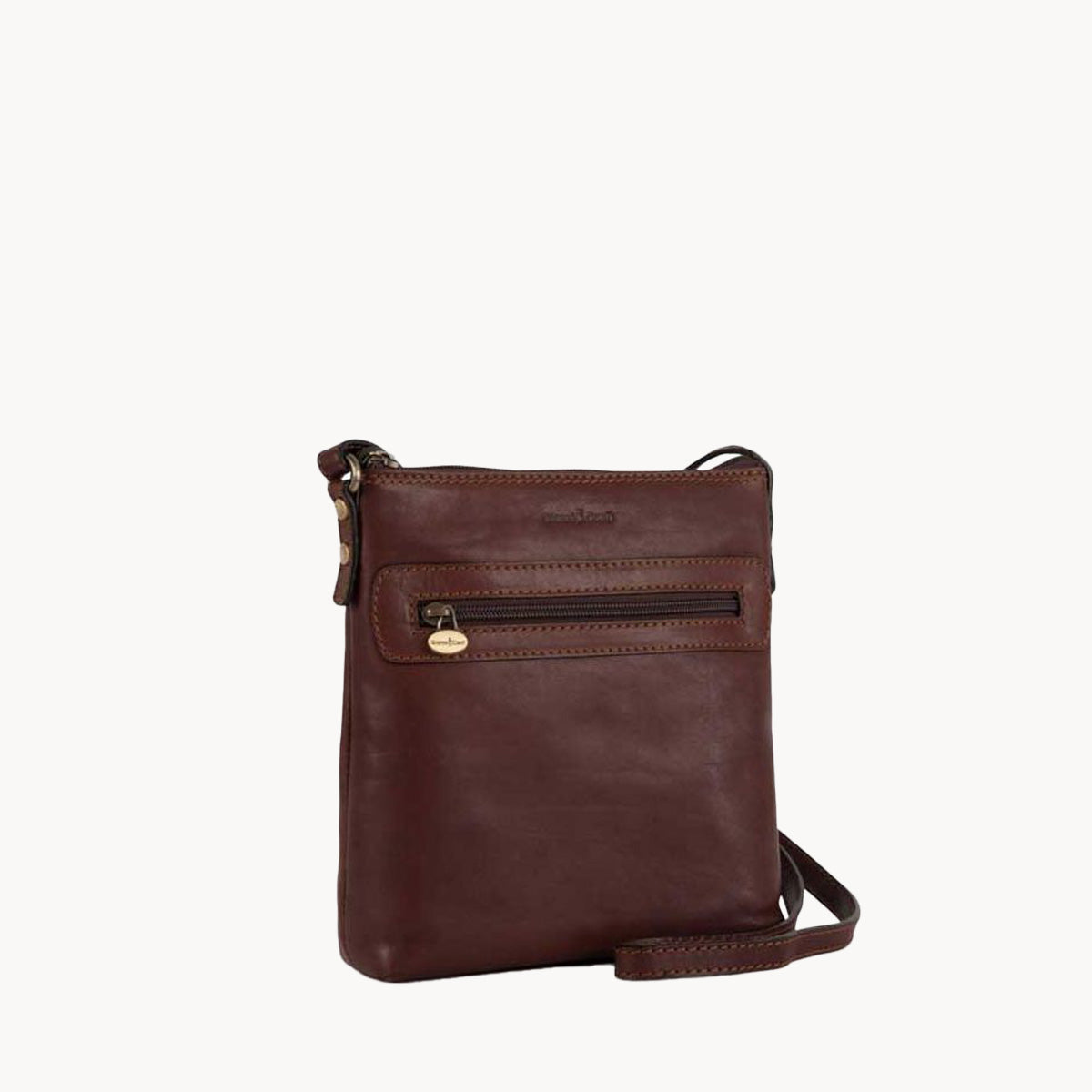 Brown leather crossbody bag on a white background