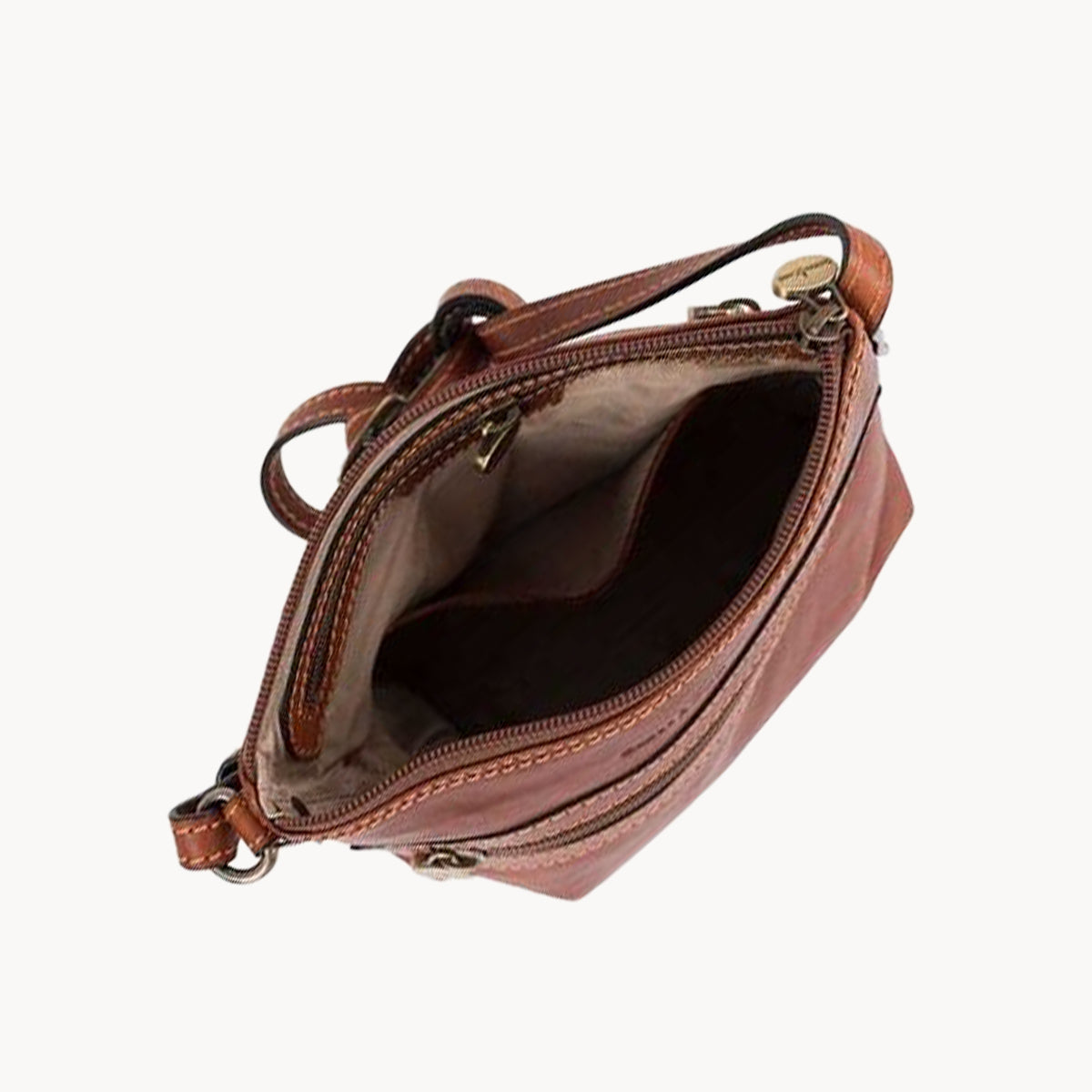 Brown leather crossbody bag on a white background