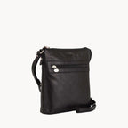 Gianni Conti Medium Leather Crossbody Bag in Black - front view showing adjustable strap and zip fastening