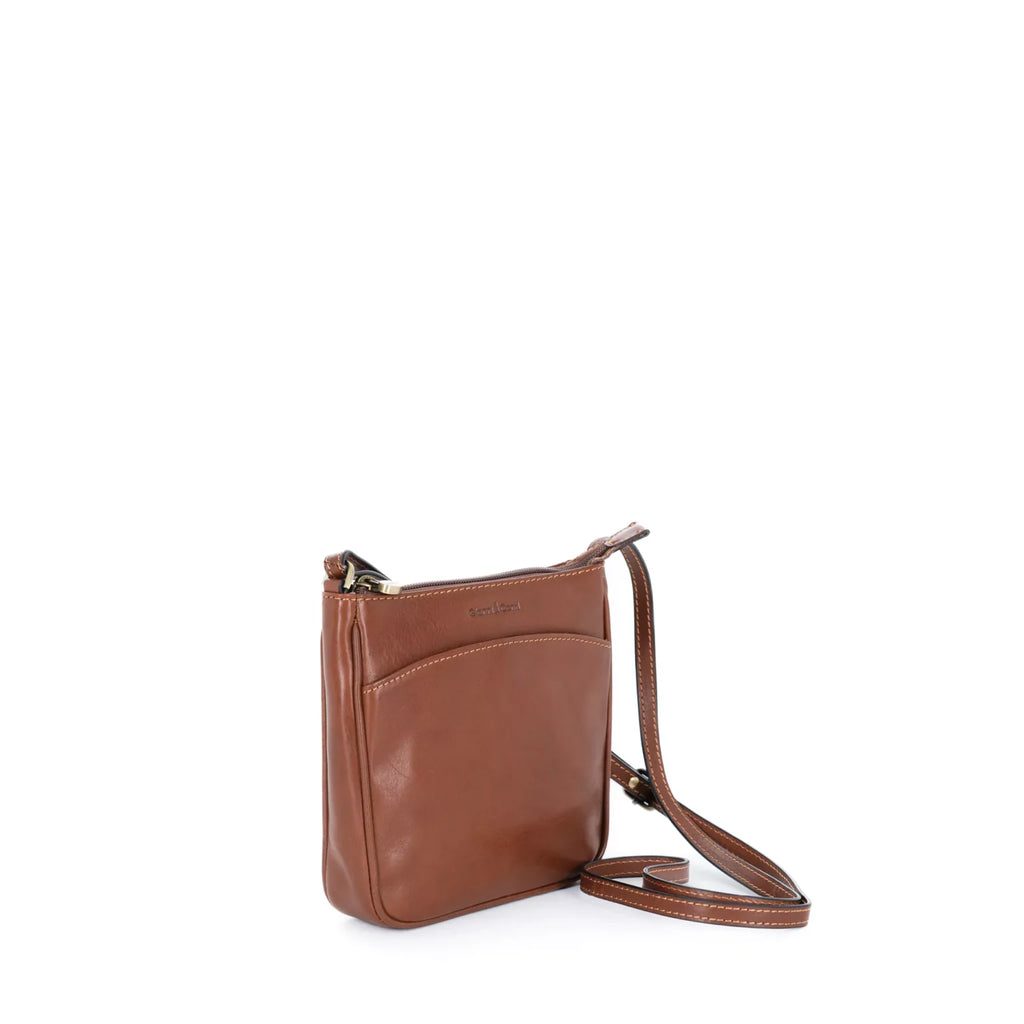Gianni Conti Classic Leather Crossbody Bag in Tan - side view showing compact depth and Italian leather texture