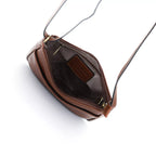 Gianni Conti Classic Leather Crossbody Bag in Tan - detail of zip hardware and leather quality