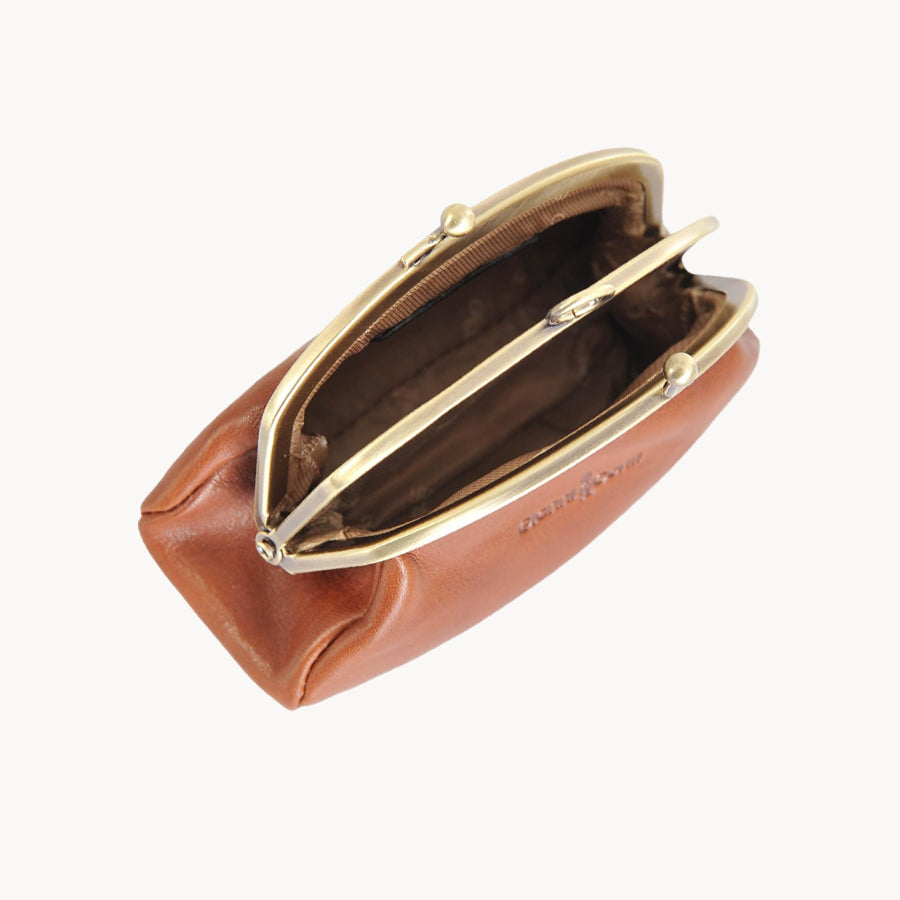Tan leather coin purse with gold clasp on a white background