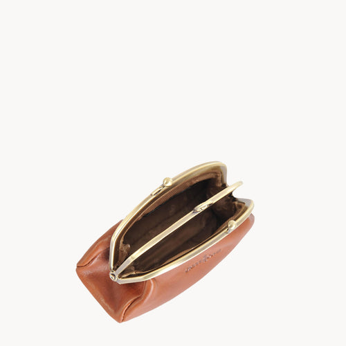 Gianni Conti Clip Top Leather Coin Purse in Tan - side view showing compact depth and Italian leather texture