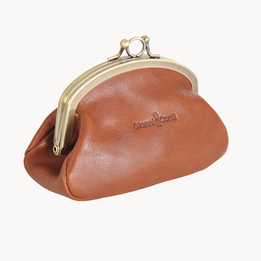 Tan leather coin purse with gold clasp on a white background