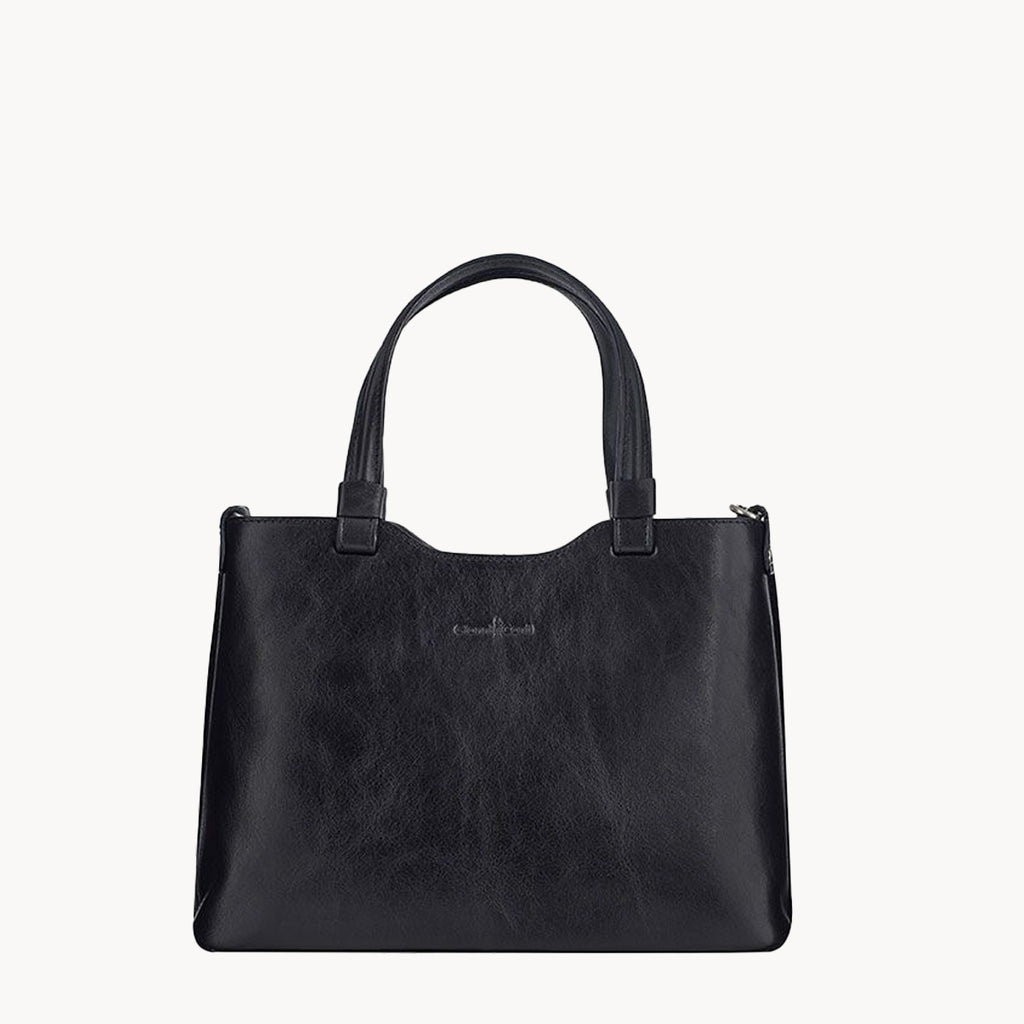 Black handbag on a white background