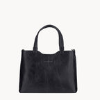 Black handbag on a white background