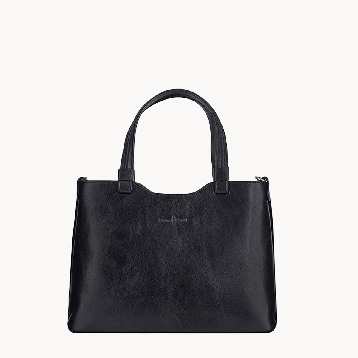 Black handbag on a white background