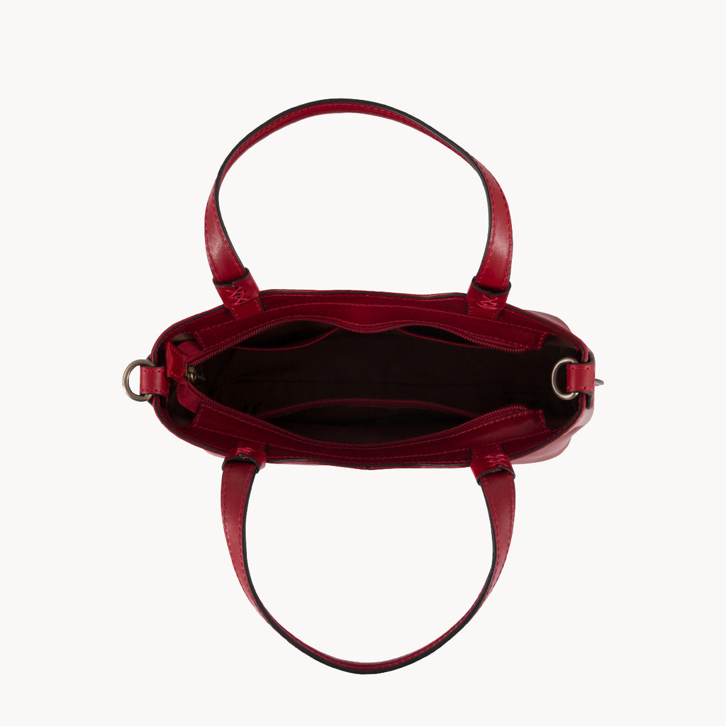 Red handbag from above on a white background