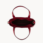 Red handbag from above on a white background