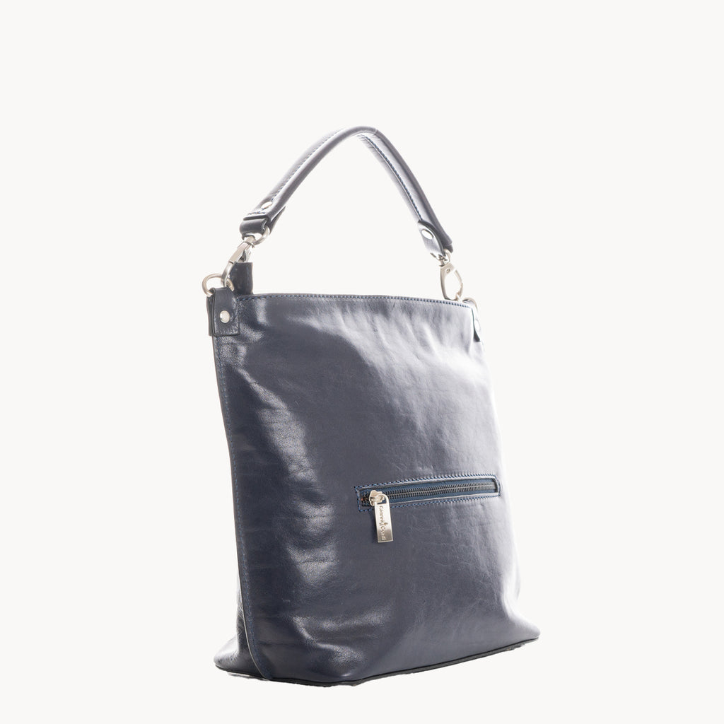 Blue handbag with a zipper on a white background