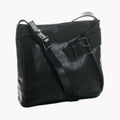 Gianni Conti Medium Leather Crossbody Bag with Buckle Detail in Black - front view showing adjustable strap