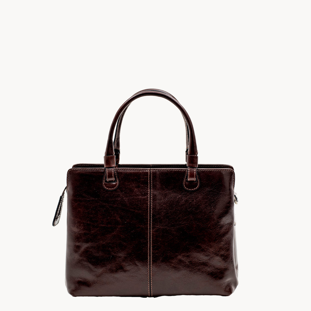 Brown leather grab bag on a white background